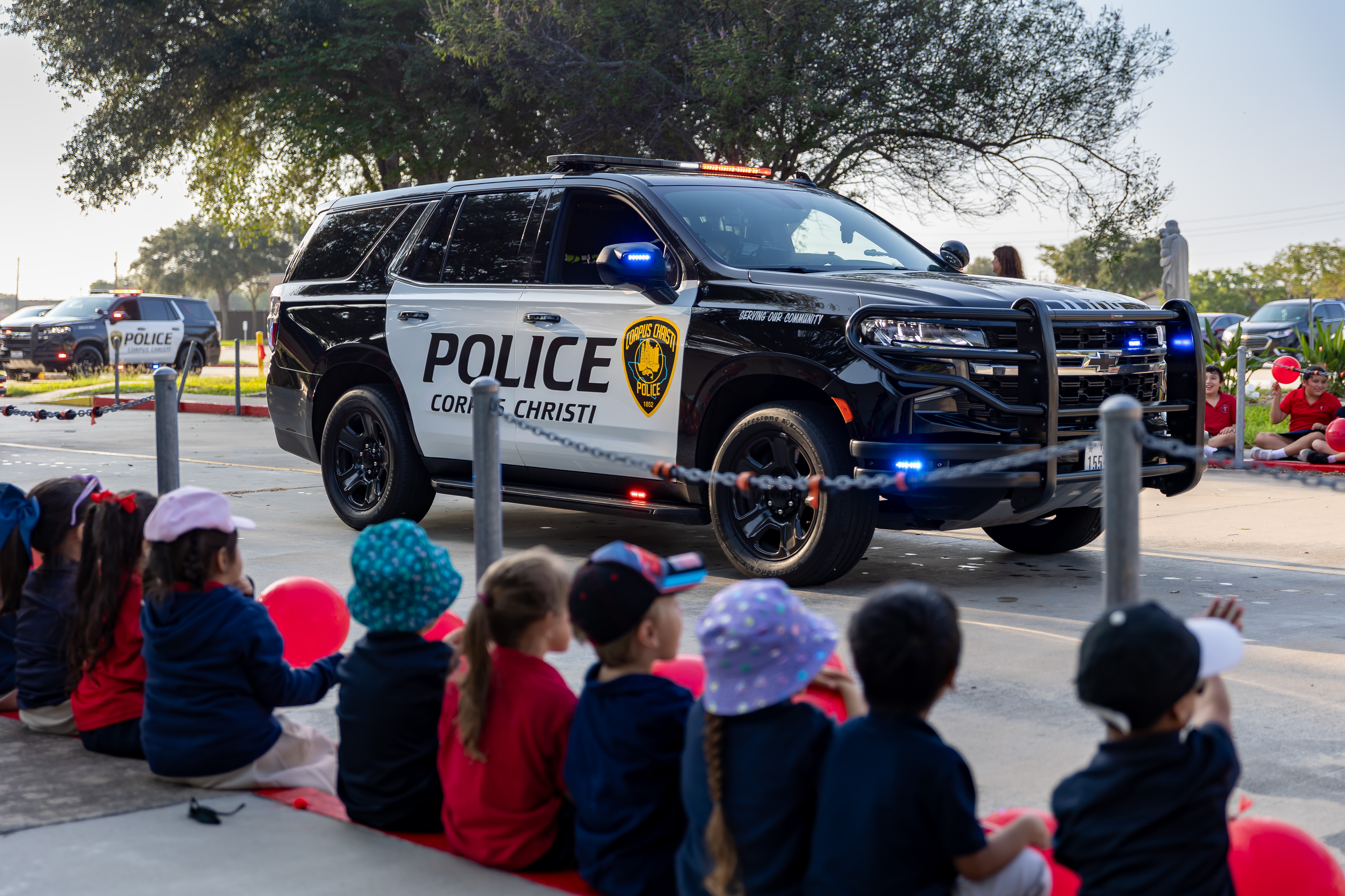 police suv at parade with children